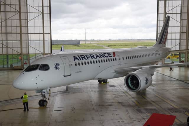The First Air France Airbus A220-300 during its unveiling at Air France facility in Roissy-Charles-de-Gaulle airport, on September 29, 2021. (Photo by ERIC PIERMONT/AFP via Getty Images)