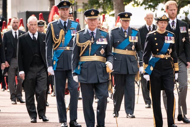 (L-R) Earl of Snowden, Prince William, Prince of Wales, King Charles III, the Duke of Gloucester, Princess Anne, Princess Royal and Prince Harry, Duke of Sussex 