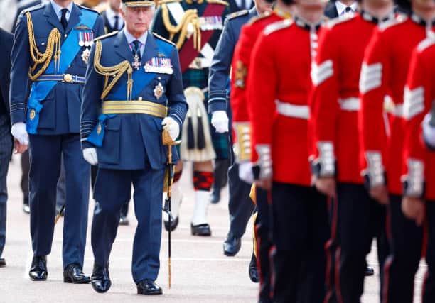 Major Thompson can be seen in the background of the Queen’s coffin procession (Pic:Getty)