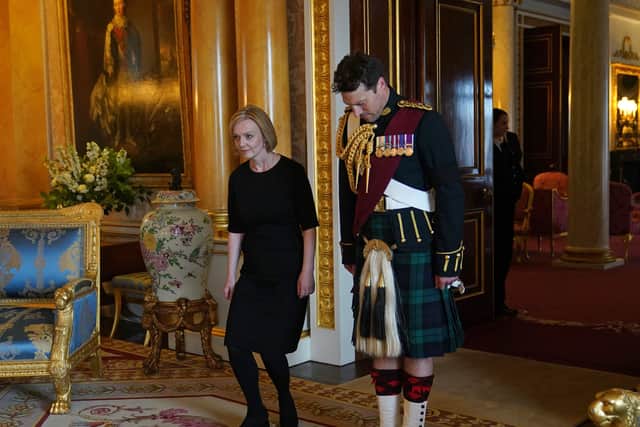 Major Thompson introducing Liz Truss to the newly proclaimed King Charles III (PIc:Getty)