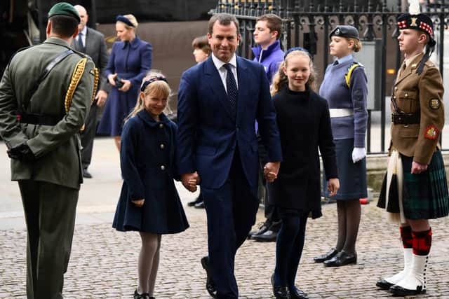 Peter Phillips and his daughters Savannah and Isla. (Photo by DANIEL LEAL/AFP via Getty Images)