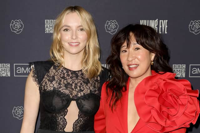Jodie Comer and Sandra Oh attend the photo call for BBC America's "Killing Eve" Season Four at The Peninsula Beverly Hills on February 08, 2022 in Beverly Hills, California. (Photo by Kevin Winter/Getty Images)