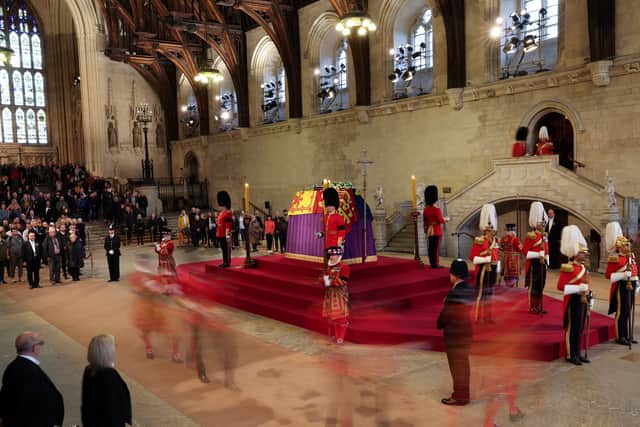 Yeomen of the Guard and Scots Guards, change guard duties around the coffin of Queen Elizabeth II, Lying in State inside Westminster Hall (Pic: POOL/AFP via Getty Images)