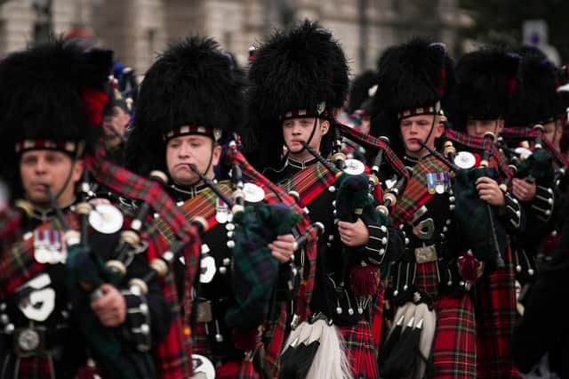  A marching band performs ahead of the state funeral and burial of Queen Elizabeth II