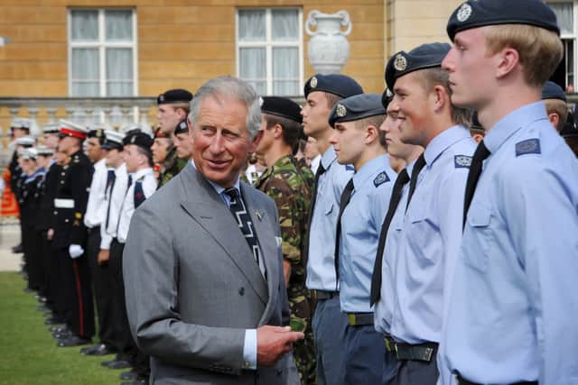  Prince Charles, Prince of Wales meets cadets during a garden party to mark the 150th anniversary of the Cadet Forces in the grounds of Buckingham Palace on July 7, 2010 in London, England.  (Photo by Stefan Rousseau - WPA Pool/Getty Images)