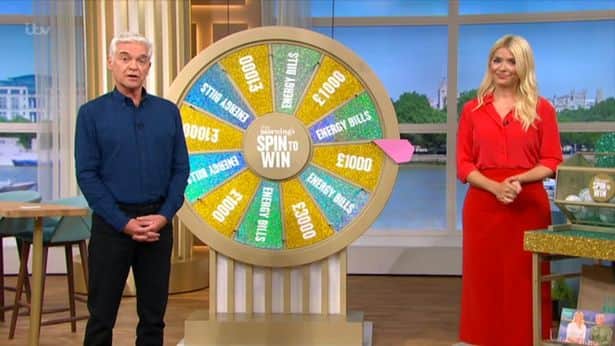 Phillip Schofield and Hollywilloughby with the spin to win wheel