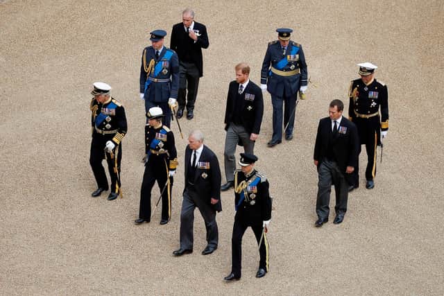 Britain's King Charles III, Britain's Princess Anne, Princess Royal, Britain's Prince Andrew, Duke of York and Britain's Prince Edward, Earl of Wessex, followed by Britain's Prince William, Prince of Wales, Britain's Prince Harry, Duke of Sussex and Peter Phillips as arrive at St George's Chapel inside Windsor Castle on September 19, 2022, ahead of the Committal Service for Britain's Queen Elizabeth II. (Photo by PETER NICHOLLS / POOL / AFP) (Photo by PETER NICHOLLS/POOL/AFP via Getty Images)
