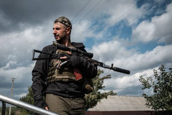 A Ukrainian soldier in the recently recaptured Kharkiv region (image: AFP/Getty Images)