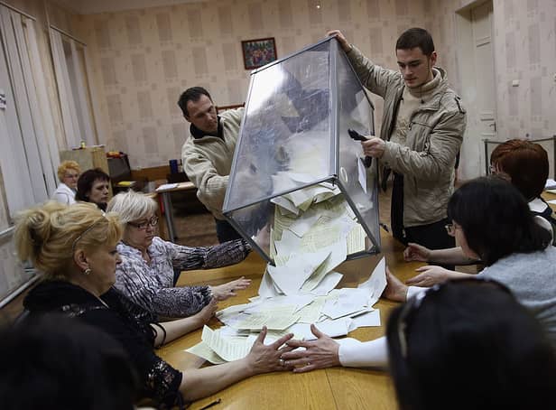 <p>Election staff count votes at a polling station during the Crimean ‘referendum’ of 2014 (Photo: Dan Kitwood/Getty Images)</p>