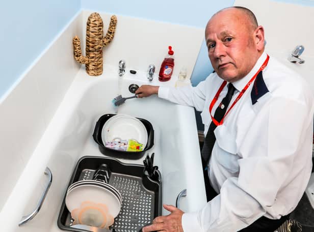 <p>Brian Simpson has been doing the washing up in the bath since January (Photo: Stuart Boulton / SWNS)</p>