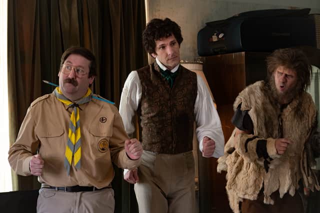 Jim Howick as Pat, Mat Baynton as Thomas Thorne, and Larry Rickard as Robin in Ghosts S4, all dancing awkwardly (Credit: BBC/Monumental/Robbie Gray)