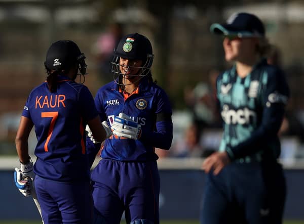 Mandhana and Kaur celebrate their respective scores during ODI between England and India