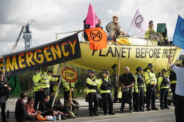 Fracking activists block the entrance to the Cuadrilla’s fracking site on September 10, 2019 near Blackpool, England. (Photo by Christopher Furlong/Getty Images)