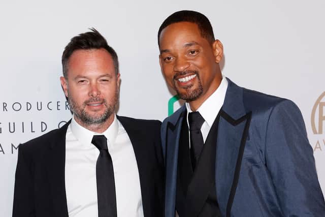 US actor-producer Will Smith (R) and producer Jon Mone (L) arrive for the 33rd Annual Producers Guild Awards at the Fairmont Century Plaza in Los Angeles on March 19, 2022. (Photo by Michael Tran / AFP) (Photo by MICHAEL TRAN/AFP via Getty Images)