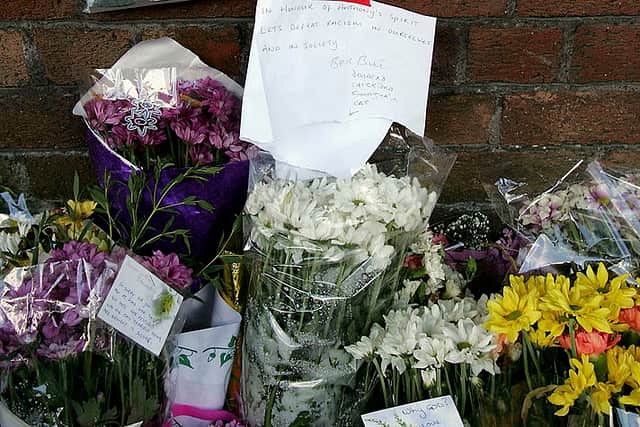 Floral tributes are laid at the scene where 18-year-old Anthony Walker died by McGoldrick Park, Huyton on August 5, 2005 in Merseyside, England  (Photo by Matthew Lewis/Getty Images)