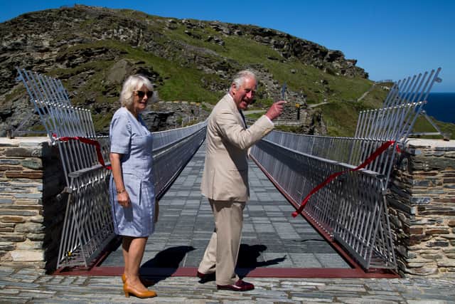 King Charles pictured with the Queen Consort Camilla in 2020 during a visit to Tintagel Castle. (Getty Images)
