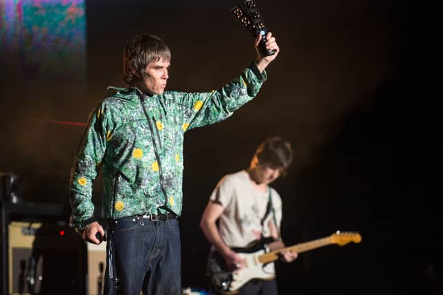  Ian Brown (L) and John Squire of The Stone Roses headline The Virgin Media Stage on day 1 of the V Festival at Hylands Park on August 18, 2012 in Chelmsford, England. (Photo by Samir Hussein/Getty Images)