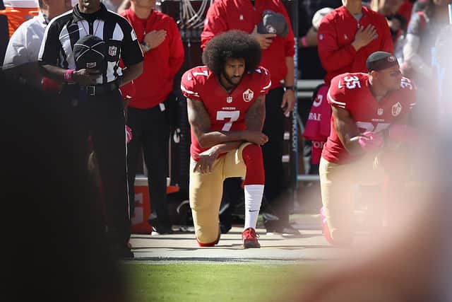 Colin Kaepernick #7 of the San Francisco 49ers kneels for the National Anthem before their game against the Tampa Bay Buccaneers at Levi’s Stadium on October 23, 2016 in Santa Clara, California.  (Photo by Ezra Shaw/Getty Images)