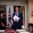 Conservative peer Baroness Sayeeda Warsi and centrist spin doctor Alistair Campbell stood in an office, with a Union flag behind them (Credit: Rhian Ap Gruffydd)