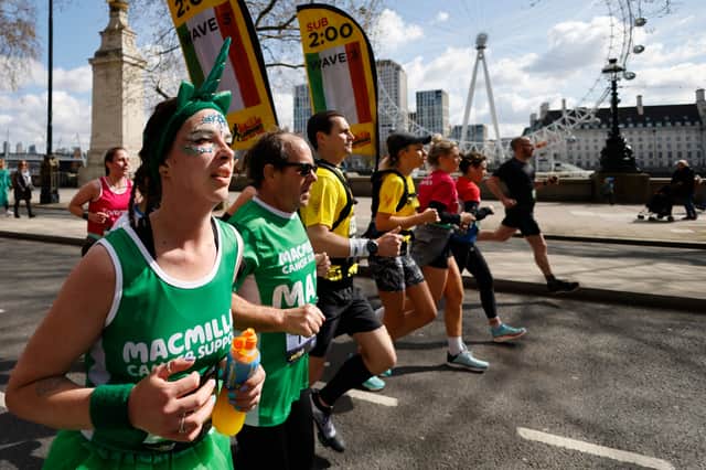 Runners compete in the 2022 London Landmarks Half Marathon (Photo by TOLGA AKMEN/AFP via Getty Images)