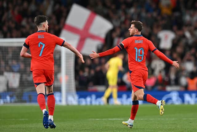 England’s midfielder Mason Mount (R) celebrates scoring the team’s second goal with England’s midfielder Declan Rice during the UEFA Nations League group A3 football match between England and Germany at Wembley stadium in north London on September 26, 2022. 