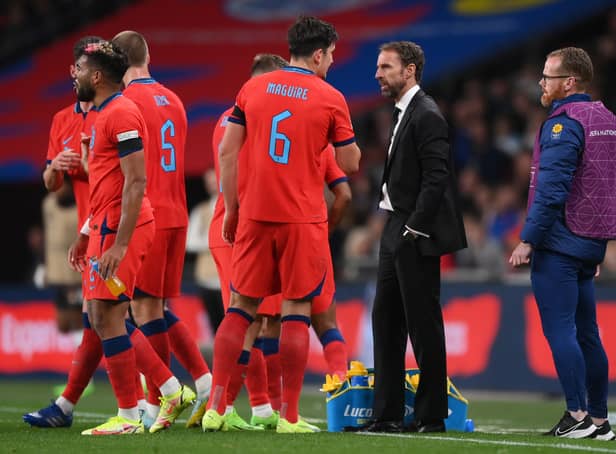 <p>Gareth Southgate, Manager of England speaks with Harry Maguire of England during the UEFA Nations League League A Group 3 match between England and Germany at Wembley Stadium on September 26, 2022 in London, England. </p>