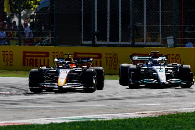 Max Verstappen overtakes George Russell in Italy in September 2022