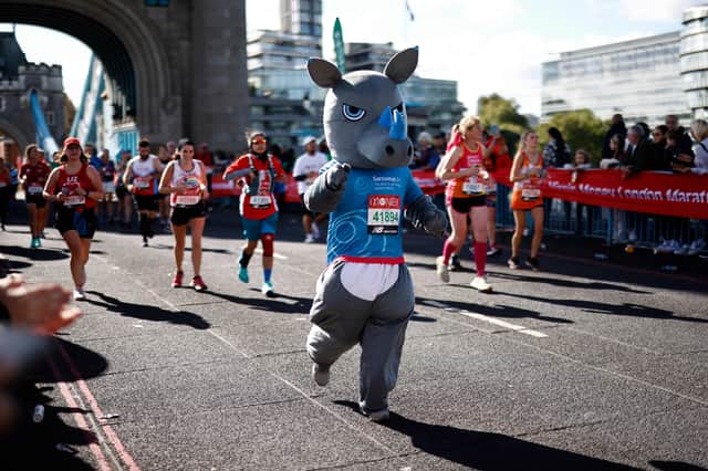 A runner in fancy dress competes in the 2021 London Marathon 