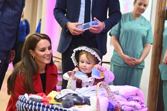 Princess Kate was praised for her interactions with Charlotte as they helped pack support bags