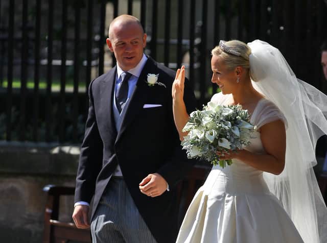 Mike Tindall and Zara Phillips after their Royal wedding at Canongate Kirk on July 30, 2011 in Edinburgh, Scotland. (Photo by Jeff J Mitchell/Getty Images)