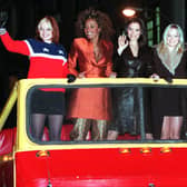 The Spice Girls pose on top of a double decker bus to promote their move “Spice World” in 1997 (Pic: AFP via Getty Images)