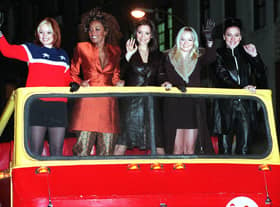 The Spice Girls pose on top of a double decker bus to promote their move “Spice World” in 1997 (Pic: AFP via Getty Images)