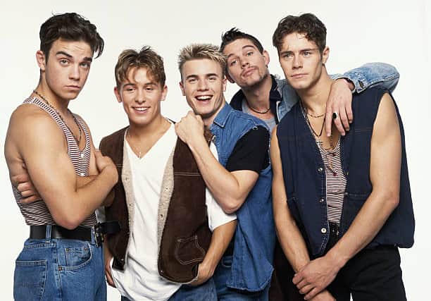 Take That formed in 1990 featuring Robbie Williams, Mark Owen, Gary Barlow, Jason Orange and Howard Donald (Pic:Getty)