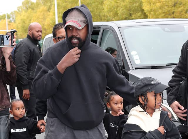 Kanye West, Saint West, Psalm West and Chicago West attend the Balenciaga Womenswear Spring/Summer 2023 show as part of Paris Fashion Week on October 02, 2022 in Villepinte, France. (Photo by Jacopo M. Raule/Getty Images For Balenciaga )