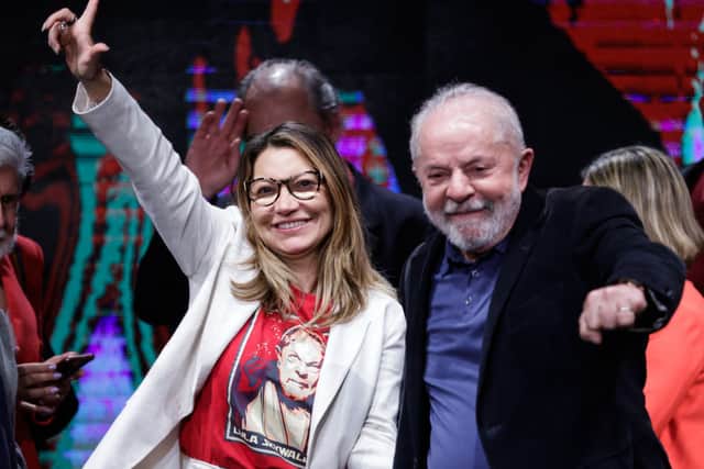 Former President of Brazil and Workers’ Party candidate Lula da Silva and his wife Rosangela da Silva wave to supporters at a press conference. Credit: Getty Images