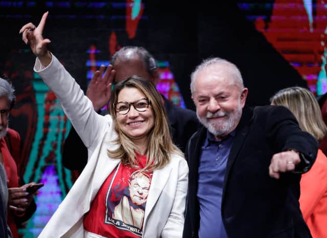 Former President of Brazil and Workers’ Party candidate Lula da Silva and his wife Rosangela da Silva wave to supporters at a press conference. Credit: Getty Images