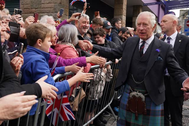 King Charles III greets members of the public after an official council meeting at the City Chambers in Dunfermline, Fife