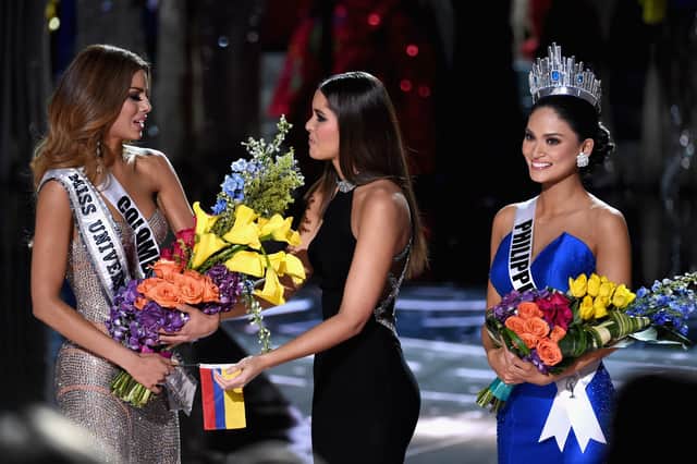 Miss Colombia 2015, Ariadna Gutierrez Arevalo, Miss Universe 2014 Paulina Vega and Miss Phillipines 2015, Pia Alonzo Wurtzbach, react after it was announced that host Steve Harvey mistakenly named Gutierrez Arevalo the winner instead of Wurtzbach during the 2015 Miss Universe Pageant at The Axis at Planet Hollywood Resort & Casino on December 20, 2015 in Las Vegas, Nevada. Vega had to remove the crown from Gutierrez Arevalo and give it to Wurtzbach.  (Photo by Ethan Miller/Getty Images)