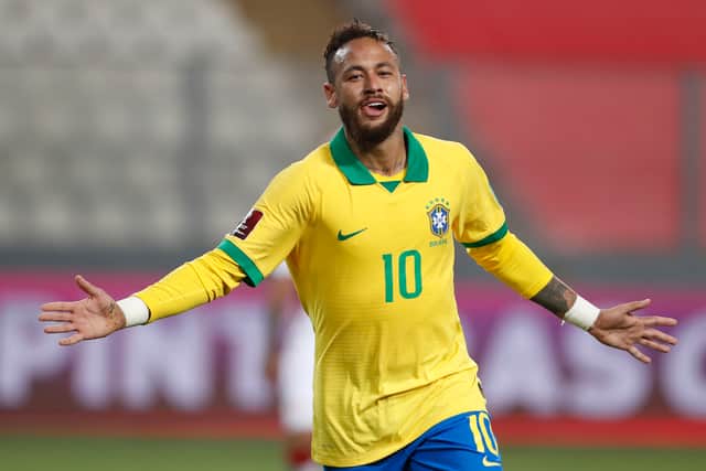 The iconic yellow shirts worn by the Brazil national football team have become a politicised symbol - but why? (Credit: Getty Images)