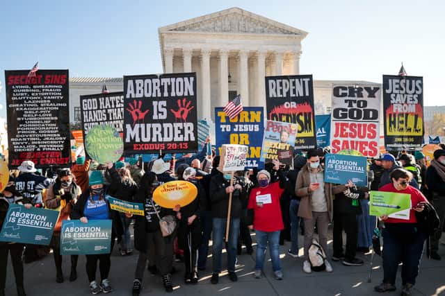 Demonstators gather in front of the U.S. Supreme Court. Credit: Getty Images