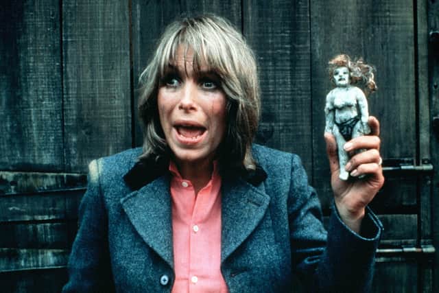 An image from Hammer House of Horror, in which a panicked woman is holding a voodoo doll (Credit: ITV)