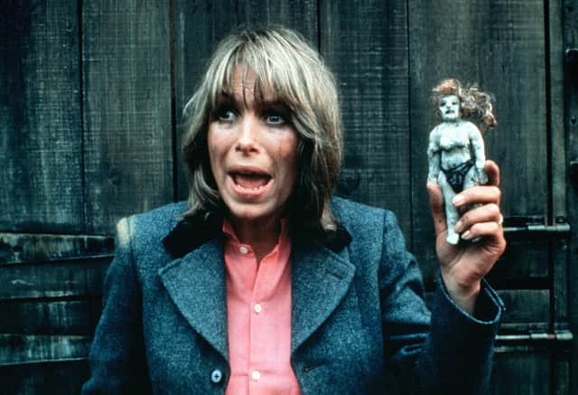 An image from Hammer House of Horror, in which a panicked woman is holding a voodoo doll (Credit: ITV)