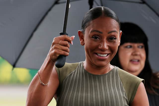  Mel B walks in the Paddock before the F1 Grand Prix of Great Britain at Silverstone on July 14, 2019 