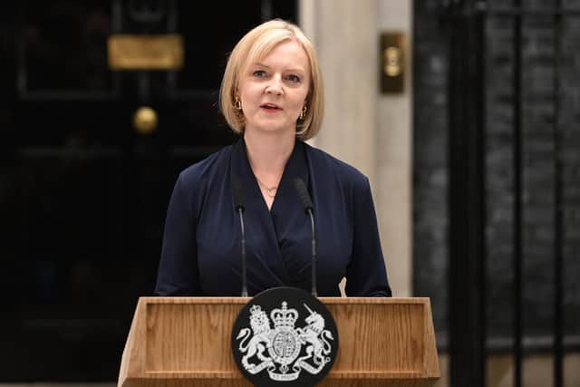 Liz Truss has been through the wringer during her first month in power - but how early could she be forced out? (Credit: Getty Images)