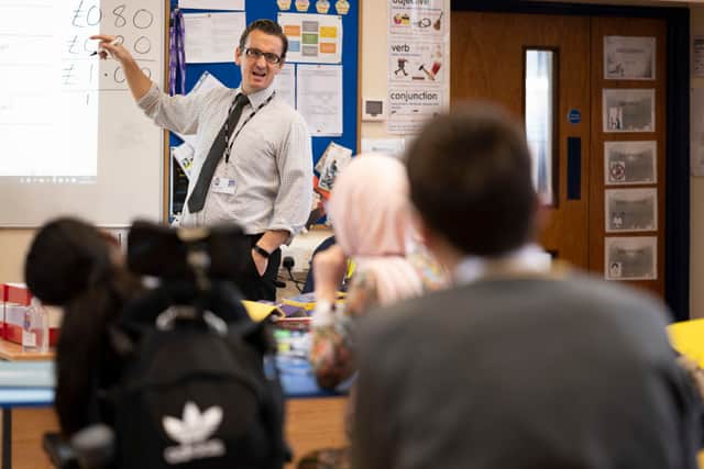 A teacher holds a maths class at Whitchurch High School on September 14, 2021 in Cardiff, Wales. (Photo by Matthew Horwood/Getty Images)