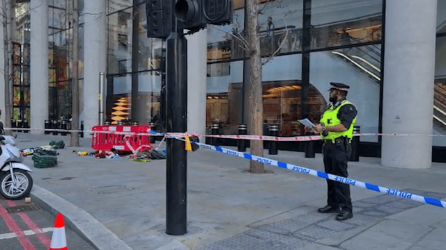 Police at the scene after three people were taken to hospital following reports of stabbings at Bishopsgate in London.