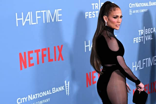 US singer-actress Jennifer Lopez arrives for the premiere of "Halftime" on opening night of the Tribeca Festival at the United Palace in New York, June 8