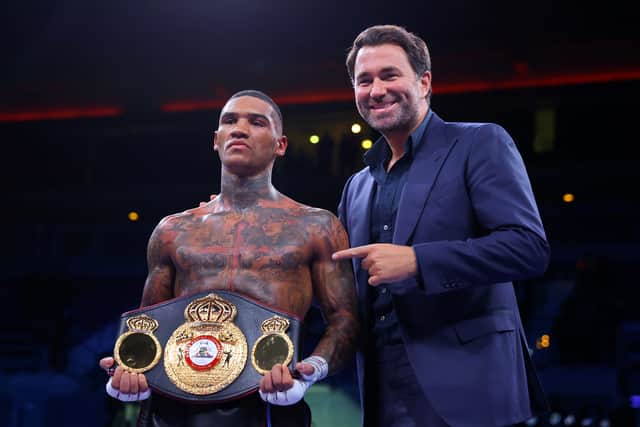 Eddie Hearn, right, with Conor Benn after WBA Continental Welterweight victory in December 2011
