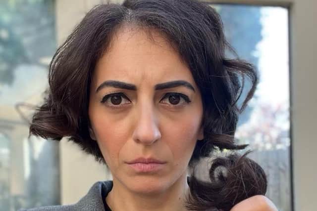 Elika Ashoori cut her hair live on television in solidarity with female protesters in Iran. Credit: PA