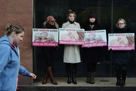 Pro-life activists protest outside an abortion clinic in Belfast (Getty Images)